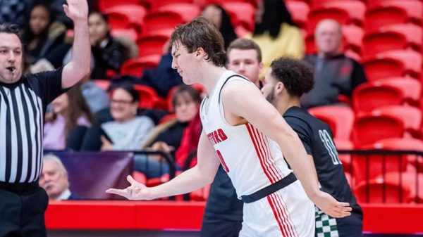 Men’s Basketball Holds Off Curry College